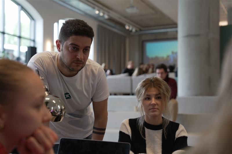 Sergei mentoring at a workshop